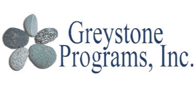 A green background with the words greystone programs in blue.