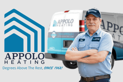 Appolo Heating technician standing confidently with arms crossed in front of an Appolo Heating service van and company logo.